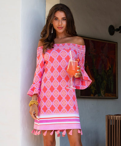 Woman wearing Coral Geo Off The Shoulder Dress